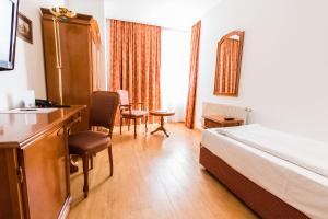 Postel nebo postele na pokoji v ubytování Familie Hopfeld - Hotel Dreikönigshof