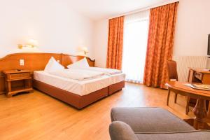 Postel nebo postele na pokoji v ubytování Familie Hopfeld - Hotel Dreikönigshof
