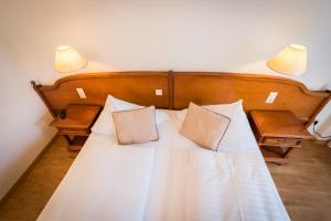 Postel nebo postele na pokoji v ubytování Familie Hopfeld - Hotel Dreikönigshof
