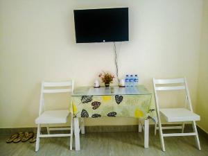 TV a/nebo společenská místnost v ubytování ATP Guesthouse + 9 fotografií