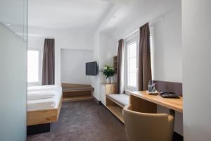 Postel nebo postele na pokoji v ubytování Hotel Seehof