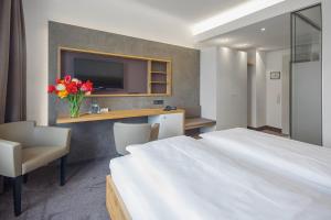 Postel nebo postele na pokoji v ubytování Hotel Seehof