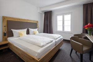 Postel nebo postele na pokoji v ubytování Hotel Seehof