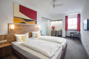 Postel nebo postele na pokoji v ubytování Hotel Seehof