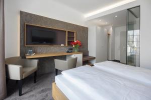 TV a/nebo společenská místnost v ubytování Hotel Seehof