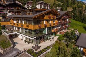 an aerial view of a house with a balcony at Hotel Garnì Gardena - Appartments in Santa Cristina in Val Gardena