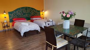 Postel nebo postele na pokoji v ubytování B&B La Tartaruga