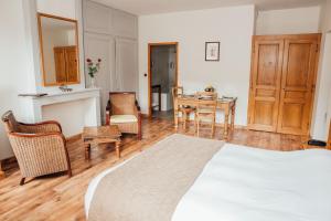Postel nebo postele na pokoji v ubytování Appart Hotel Charles Sander