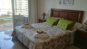 A bed or beds in a room at Sol Paraiso
