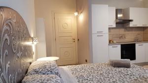 Postel nebo postele na pokoji v ubytování B&B La Tartaruga