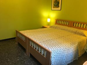 Een bed of bedden in een kamer bij B&B In Centro