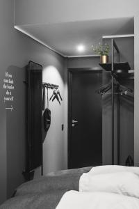 Ένα ή περισσότερα κρεβάτια σε δωμάτιο στο Quality Hotel The Box