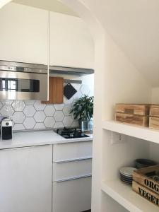 Cucina o angolo cottura di La Casa di Ringhiera