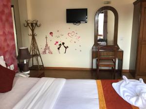 Una cama o camas en una habitación de Hotel Pokhara View