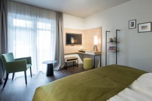 Voodi või voodid majutusasutuse stattHotel Weimar toas