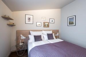 Voodi või voodid majutusasutuse stattHotel Weimar toas