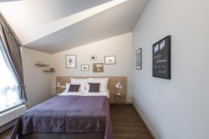 Voodi või voodid majutusasutuse stattHotel Weimar toas