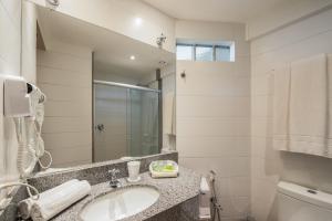 Koupelna v ubytování Hotel Sete Coqueiros