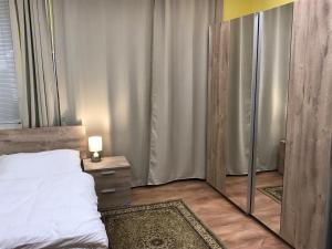 Postel nebo postele na pokoji v ubytování DNM Inn
