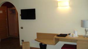 TV a/nebo společenská místnost v ubytování Hotel Garni Vittoria
