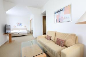TV a/nebo společenská místnost v ubytování Hotel Concordia