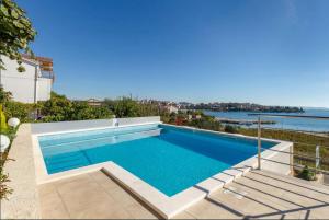 Bazén v ubytovaní Piscina Apartments alebo v jeho blízkosti