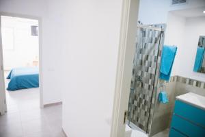 Postel nebo postele na pokoji v ubytování Apartamentos Ocean View