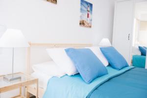 Postel nebo postele na pokoji v ubytování Apartamentos Ocean View