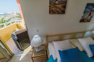 Postel nebo postele na pokoji v ubytování Apartamentos Ocean View