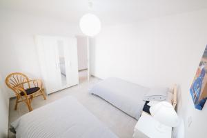 Postel nebo postele na pokoji v ubytování Apartamentos Ocean View