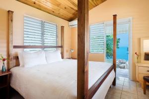 Postel nebo postele na pokoji v ubytování Luna Sea Inn