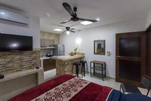 TV a/nebo společenská místnost v ubytování Merida Serviced Apartments