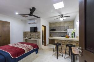 Kuchyň nebo kuchyňský kout v ubytování Merida Serviced Apartments