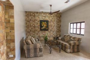 Posezení v ubytování Merida Serviced Apartments