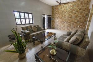 Posezení v ubytování Merida Serviced Apartments