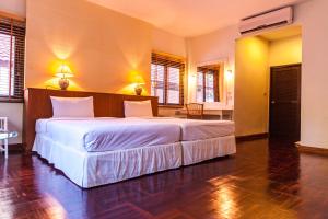 Coco Palm Beach Resort - SHA Extra Plus客房内的一张或多张床位