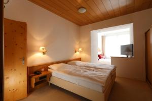 Postel nebo postele na pokoji v ubytování Hotel Concordia