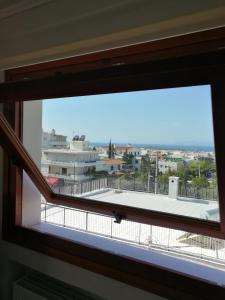 A balcony or terrace at Leo - Unique Glyfada Apartment