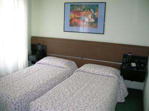 Postel nebo postele na pokoji v ubytování Hotel Molise 2