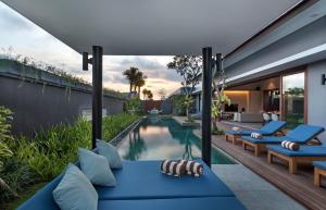 an image of a swimming pool in a house at Amarin Seminyak in Seminyak