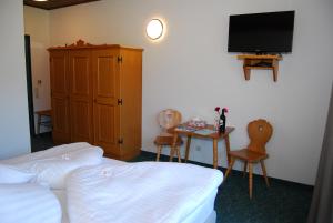 Postel nebo postele na pokoji v ubytování Hotel Sonnleitn