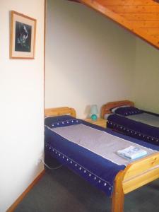 Postel nebo postele na pokoji v ubytování Topáz Vendégház