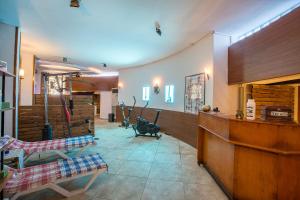 a lobby with chairs and a counter in a building at Villa Sonata in Alanya