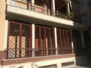 an apartment building with a balcony and a window at B&B Cuore di Salerno in Salerno