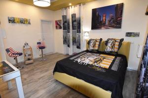 a bedroom with a large bed in a room at B&B Cuore di Salerno in Salerno