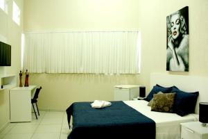 Postel nebo postele na pokoji v ubytování Blu Apart Hotel