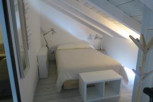 A bed or beds in a room at mirandoacuenca es