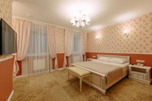 Кровать или кровати в номере Кремлевский Парк