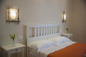 Postel nebo postele na pokoji v ubytování 3 Archi B&B