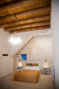 Postel nebo postele na pokoji v ubytování 3 Archi B&B